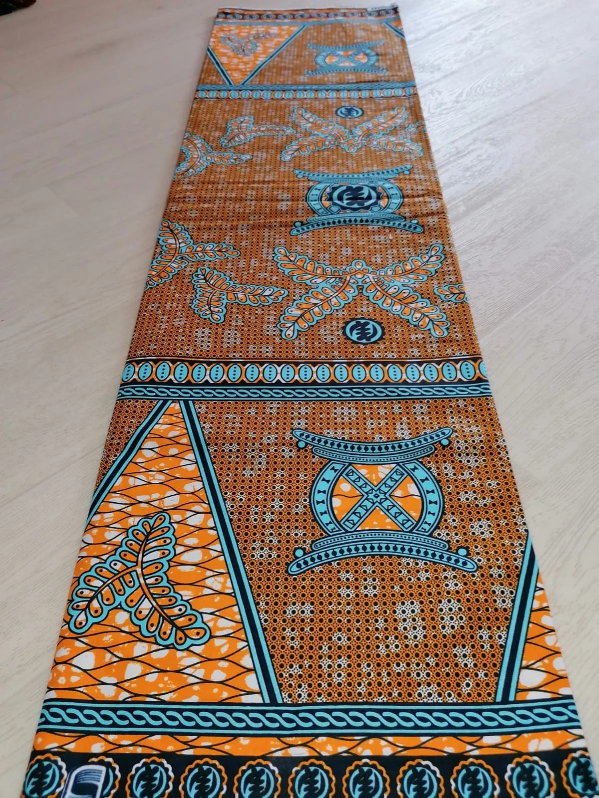 Africká látka měkčí, modro oranžová