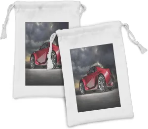 Ambesonne Cars Fabric Pouch Set of 2, Modern Red Sports Car on Dramatic Sky Backdrop with Dark Cloudscape Strong Engine, Small Drawstring Bag for Toiletries Masks and Favors, 9" x 6", Red Grey Black