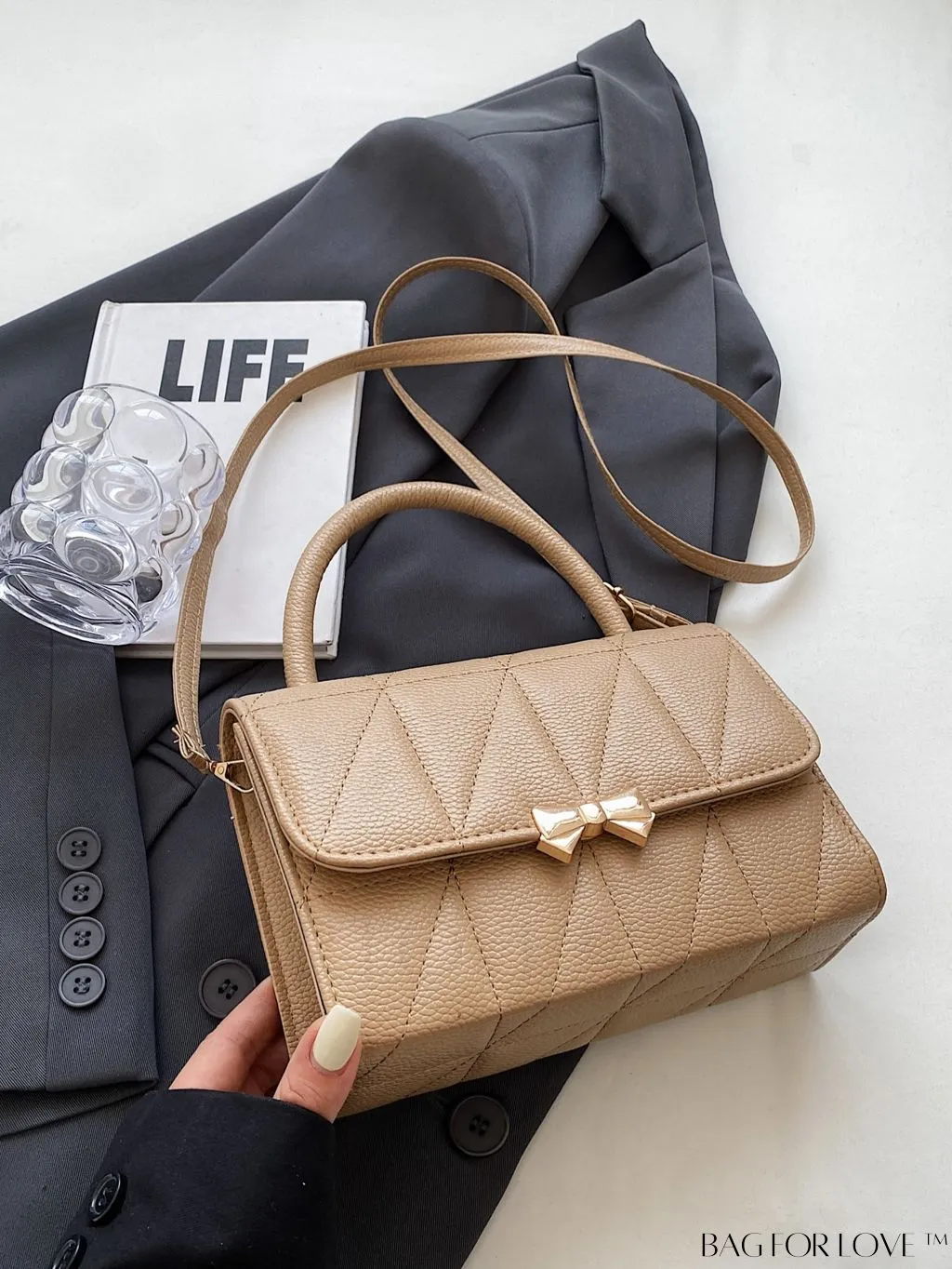 BagForLove - Chic Bow-Adorned Handbag: Adjustable Strap, Flap Closure - A Fashion Essential!