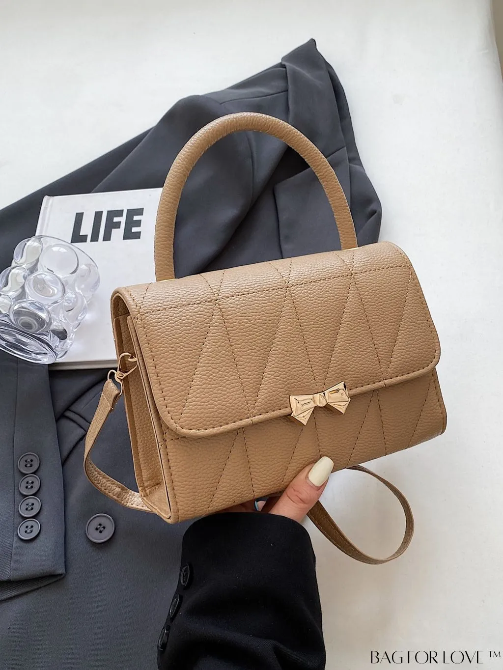 BagForLove - Chic Bow-Adorned Handbag: Adjustable Strap, Flap Closure - A Fashion Essential!