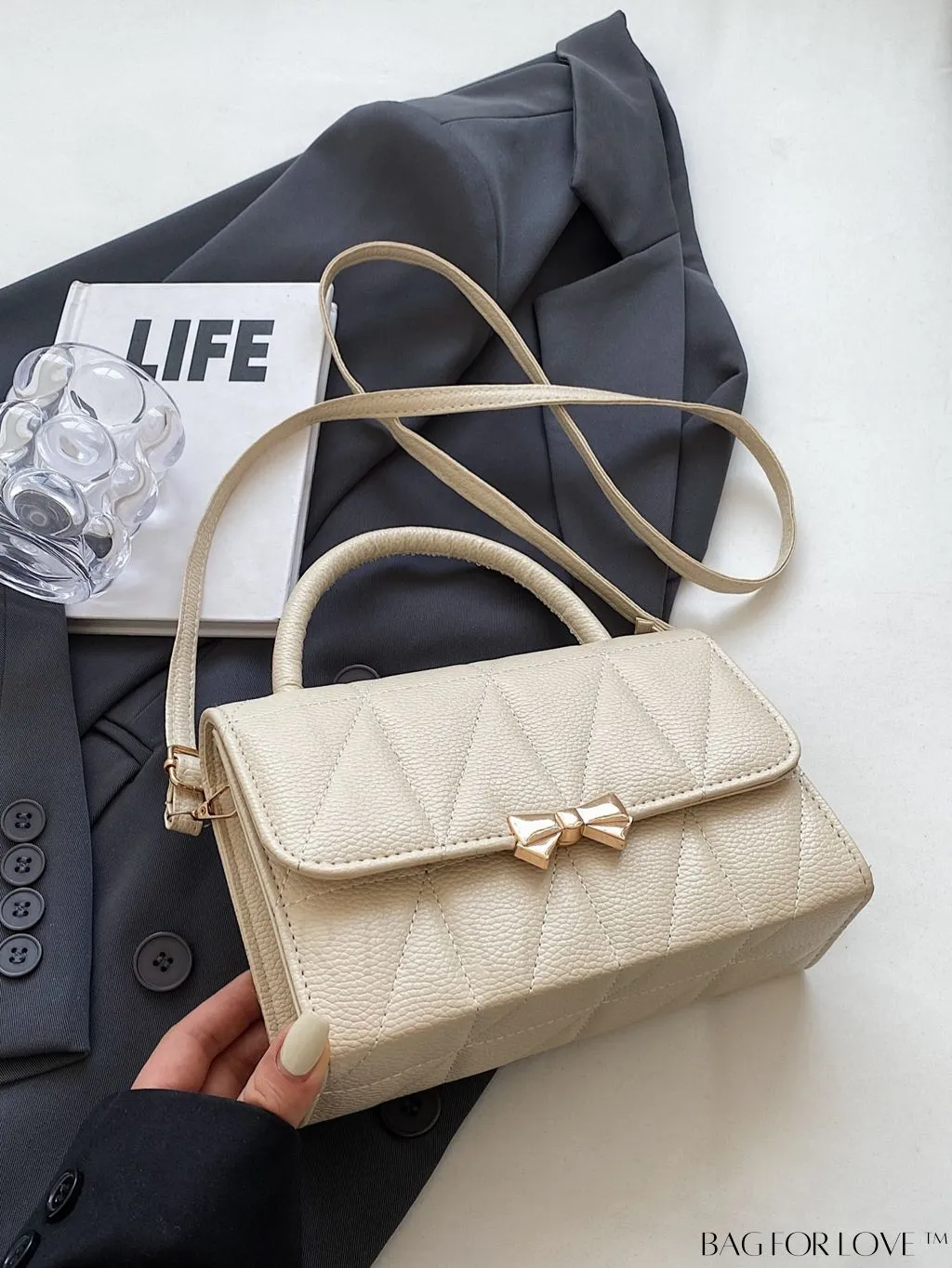 BagForLove - Chic Bow-Adorned Handbag: Adjustable Strap, Flap Closure - A Fashion Essential!