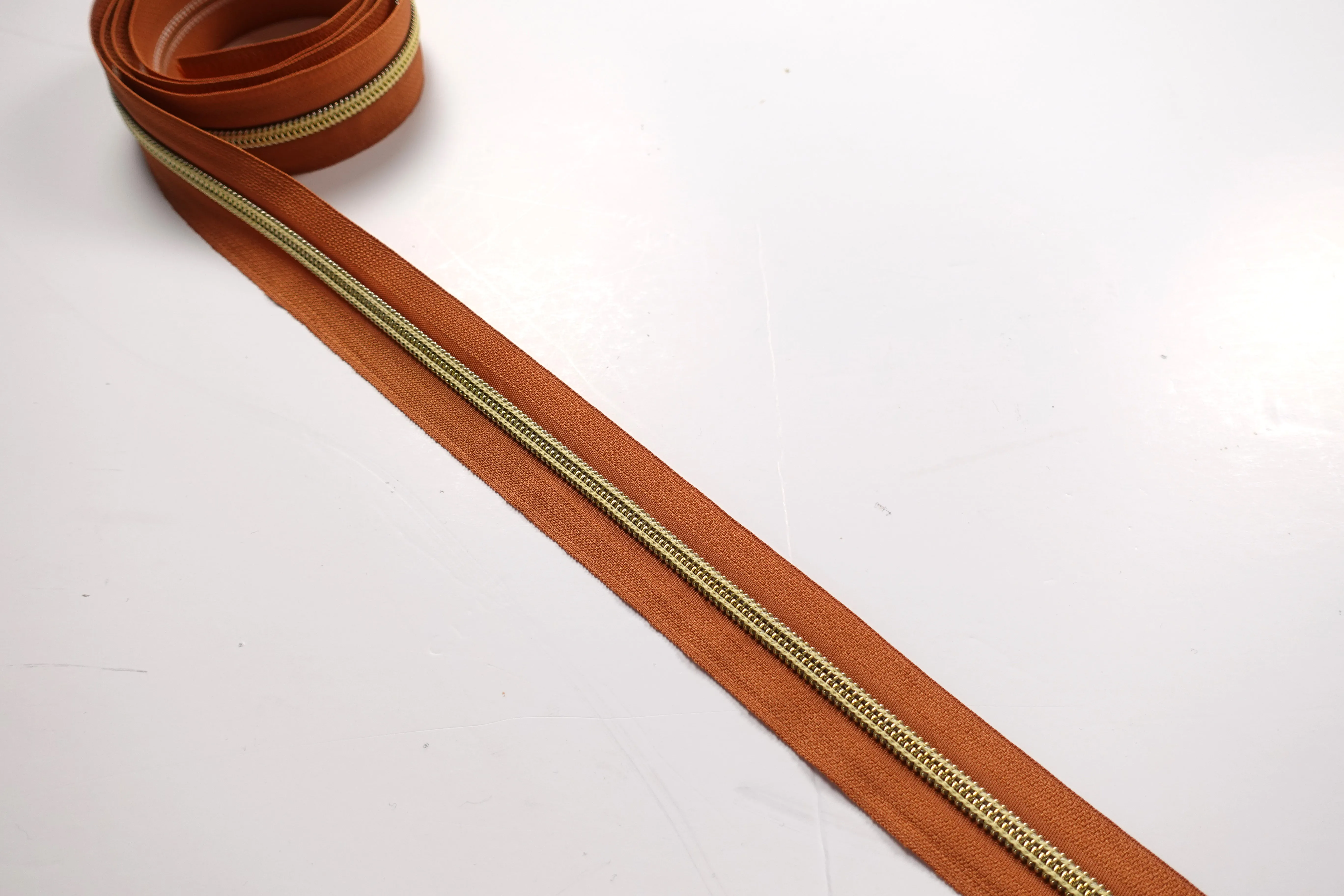 No5 Gold Teeth Nylon Zips Sold in Packs of 1 1/2 metre lengths