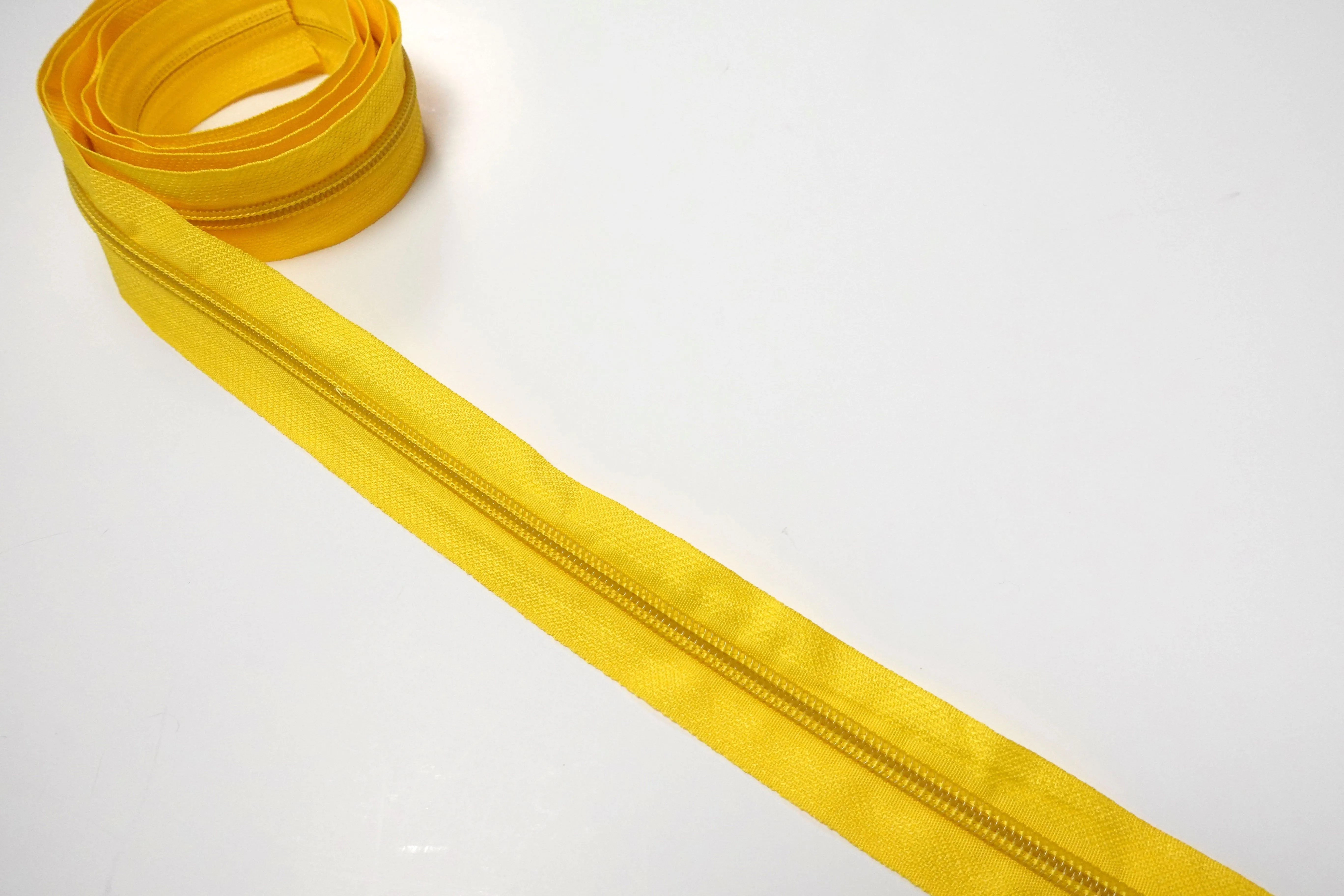 No5 Solid Coloured Nylon Zips Sold in Packs of 1 1/2 metre Lengths